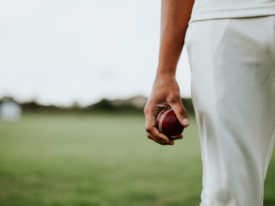 cricket-player-holding-leather-ball